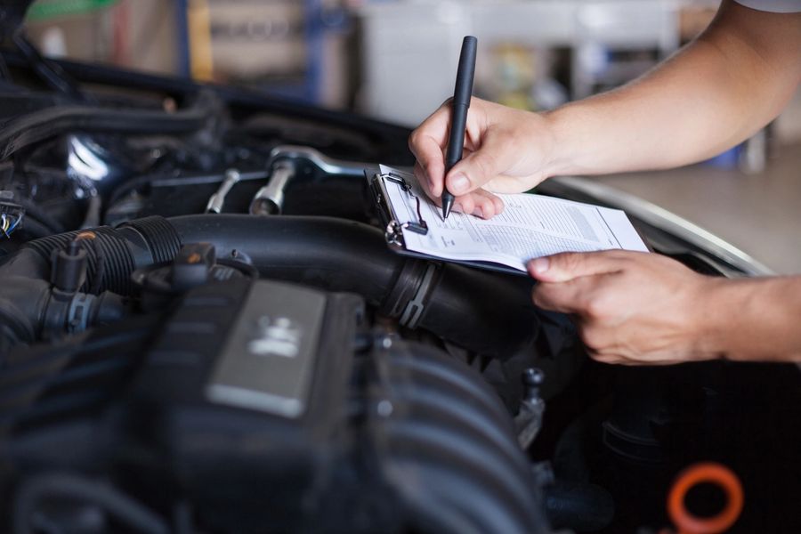 Sprinter Post technician inspecting an engine